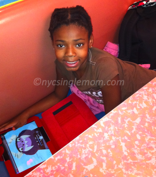 Kid Reading an iPad