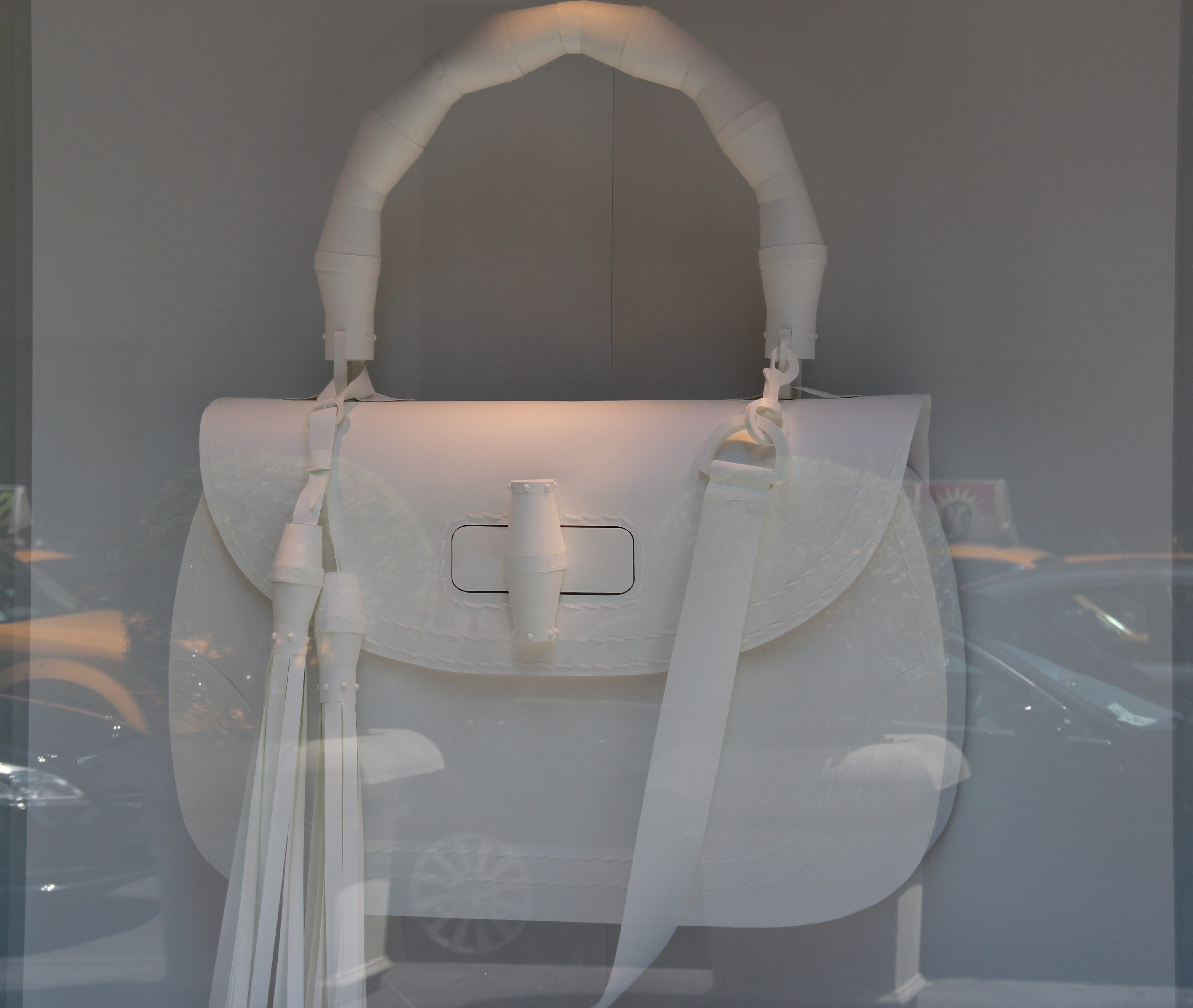 Gucci Windows featuring bags made of recycled paper