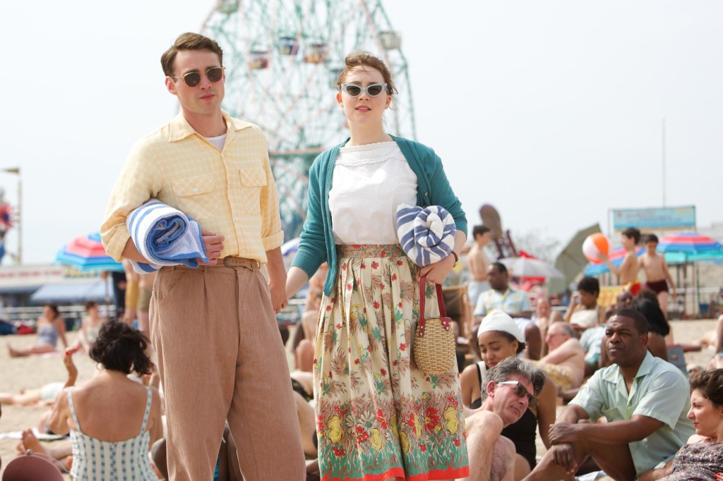 Emory Cohen as "Tony" and Saoirse Ronan as "Eilis" in BROOKLYN. Photo by Kerry Brown. © 2015 Twentieth Century Fox Film Corporation All Rights Reserved